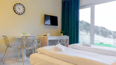 Łóżko lub łóżka w pokoju w obiekcie VacationClub - Solden Apartament 3