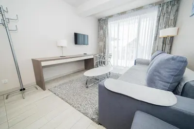 Telewizja i/lub zestaw kina domowego w obiekcie VacationClub - Tignes Apartament 31