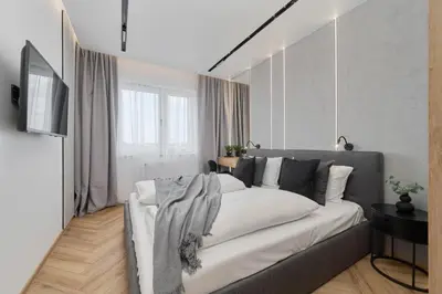 Telewizja i/lub zestaw kina domowego w obiekcie Exclusive Apartment with Balcony & Parking Wrocław by Renters Prestige
