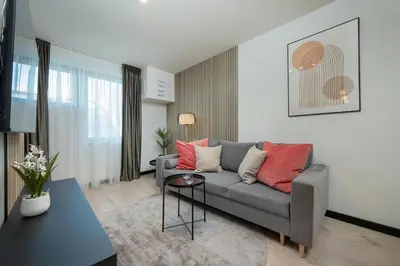 Część wypoczynkowa w obiekcie Wroclavia Apartments Dyrekcyjna by Noclegi Renters