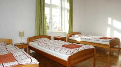 Łóżko lub łóżka w pokoju w obiekcie VaBank