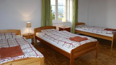 Łóżko lub łóżka w pokoju w obiekcie VaBank