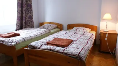 Łóżko lub łóżka w pokoju w obiekcie VaBank