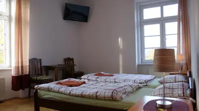 Łóżko lub łóżka w pokoju w obiekcie VaBank
