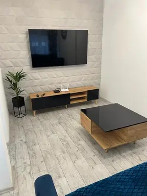 Telewizja i/lub zestaw kina domowego w obiekcie Apartament Korczak Park