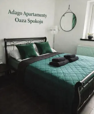 Łóżko lub łóżka w pokoju w obiekcie Adago Apartamenty Oaza Szczawno-Zdrój -Luksusowe Apartamenty - Blisko Parku Zdrojowego - Parking - Cisza i Relaks