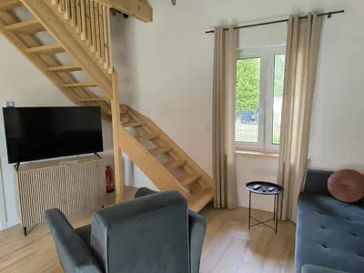 Telewizja i/lub zestaw kina domowego w obiekcie Leśna Osada