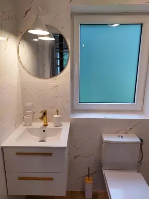 Łazienka w obiekcie Leśna Osada