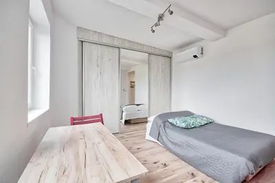 Łóżko lub łóżka w pokoju w obiekcie Stawowa Standard Studio by BookingHost