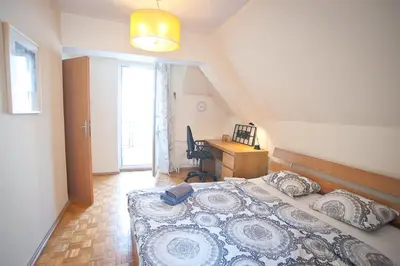 Łóżko lub łóżka w pokoju w obiekcie Center Rynek