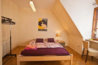 Łóżko lub łóżka w pokoju w obiekcie Center Rynek