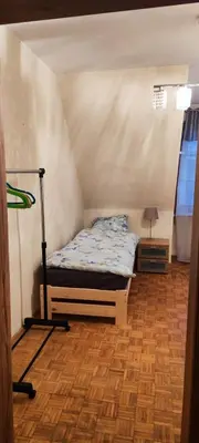 Łóżko lub łóżka w pokoju w obiekcie Center Rynek