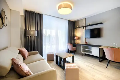 Telewizja i/lub zestaw kina domowego w obiekcie AboutArtApartments - Otyńska 4