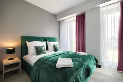 Łóżko lub łóżka w pokoju w obiekcie AboutArtApartments - Otyńska 4