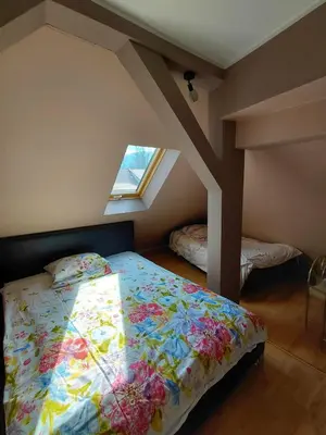 Łóżko lub łóżka w pokoju w obiekcie U Piekarza za Piecem