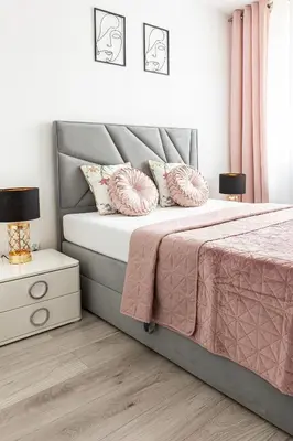 Łóżko lub łóżka w pokoju w obiekcie Apartamenty Marinet