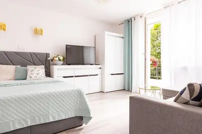 Telewizja i/lub zestaw kina domowego w obiekcie Apartamenty Marinet
