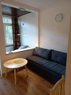Część wypoczynkowa w obiekcie Przytulny Apartament z Balkonem