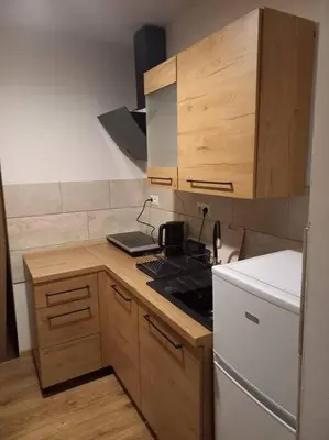 Kuchnia lub aneks kuchenny w obiekcie Przytulny Apartament z Balkonem