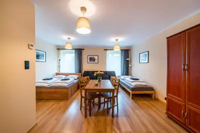 Łóżko lub łóżka w pokoju w obiekcie Apartament - Nocna Sowa