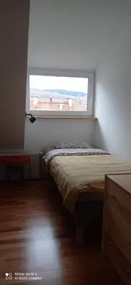 Łóżko lub łóżka w pokoju w obiekcie Apartment na Gruszy