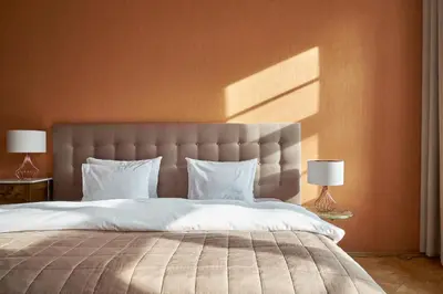 Łóżko lub łóżka w pokoju w obiekcie Boutique Pałac Warmątowice Sienkiewiczowskie