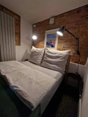 Łóżko lub łóżka w pokoju w obiekcie Apartment Emilia