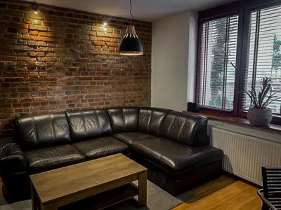 Część wypoczynkowa w obiekcie Apartament za ratuszem