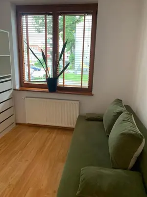 Część wypoczynkowa w obiekcie Apartament za ratuszem