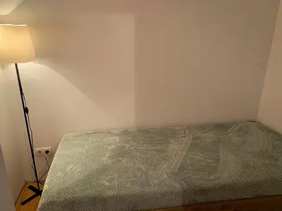 Łóżko lub łóżka w pokoju w obiekcie Apartament za ratuszem
