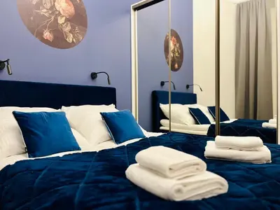 Łóżko lub łóżka w pokoju w obiekcie HO!HOUSE Bulwar Staromiejski