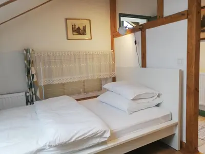 Łóżko lub łóżka w pokoju w obiekcie Apartament Jesionek agroturystyka
