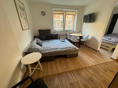 Telewizja i/lub zestaw kina domowego w obiekcie ApartamentsByMatyrafa-IV