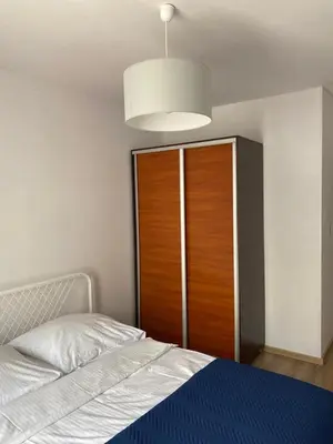 Łóżko lub łóżka w pokoju w obiekcie DAKOTA Easy Stay Center