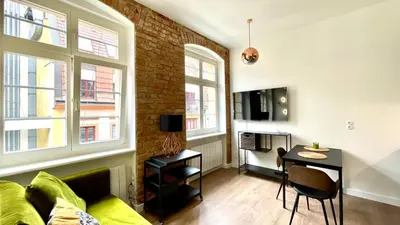 Telewizja i/lub zestaw kina domowego w obiekcie Zielona Kanapa - za 100m Rynek