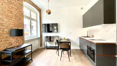 Telewizja i/lub zestaw kina domowego w obiekcie Zielona Kanapa - za 100m Rynek