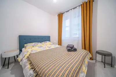 Łóżko lub łóżka w pokoju w obiekcie Stylowy apartament Blue self check in 24h
