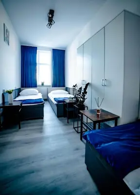 Łóżko lub łóżka w pokoju w obiekcie LOFTY APARTAMENTY Namysłów I