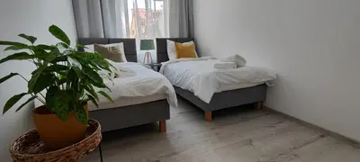 Łóżko lub łóżka w pokoju w obiekcie CITY VIEW Saperów I - przy centrum klimatyzacja