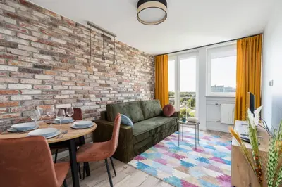 Część wypoczynkowa w obiekcie Stylish Apartment near Wroclavia for 4 Guests by Noclegi Renters