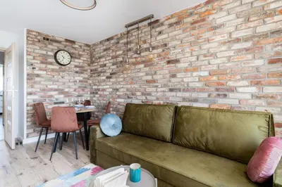 Część wypoczynkowa w obiekcie Stylish Apartment near Wroclavia for 4 Guests by Noclegi Renters