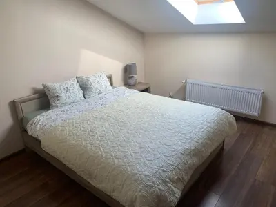 Łóżko lub łóżka w pokoju w obiekcie Apartament Bobrzańska - 4 bedrooms sypialnie