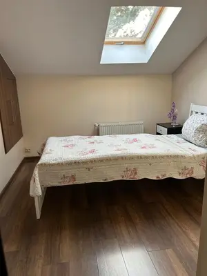 Łóżko lub łóżka w pokoju w obiekcie Apartament Bobrzańska - 4 bedrooms sypialnie