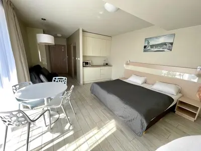 Łóżko lub łóżka w pokoju w obiekcie Apartament Ischgl 35