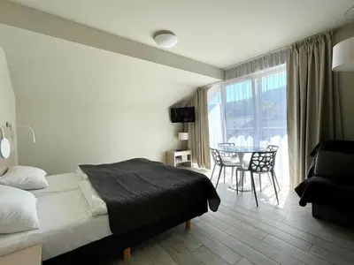 Łóżko lub łóżka w pokoju w obiekcie Apartament Ischgl 35