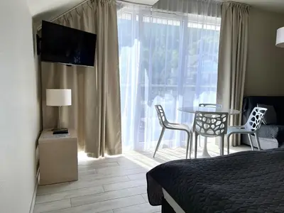 Łóżko lub łóżka w pokoju w obiekcie Apartament Ischgl 35