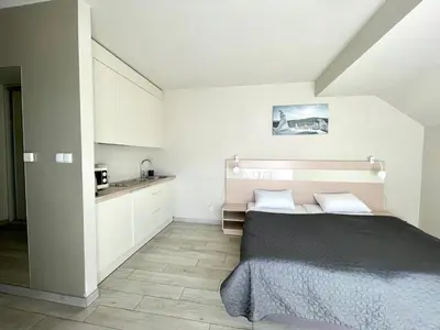 Łóżko lub łóżka w pokoju w obiekcie Apartament Ischgl 35
