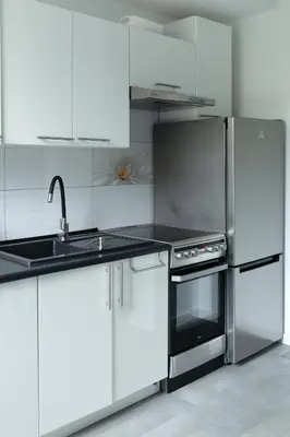 Kuchnia lub aneks kuchenny w obiekcie Family Apartment z pokojem zabaw - Centrum - 66 m
