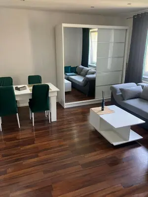 Łóżko lub łóżka w pokoju w obiekcie Apartament Centrum