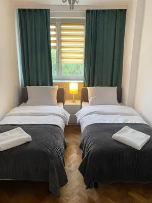 Łóżko lub łóżka w pokoju w obiekcie Tabago Studio 10